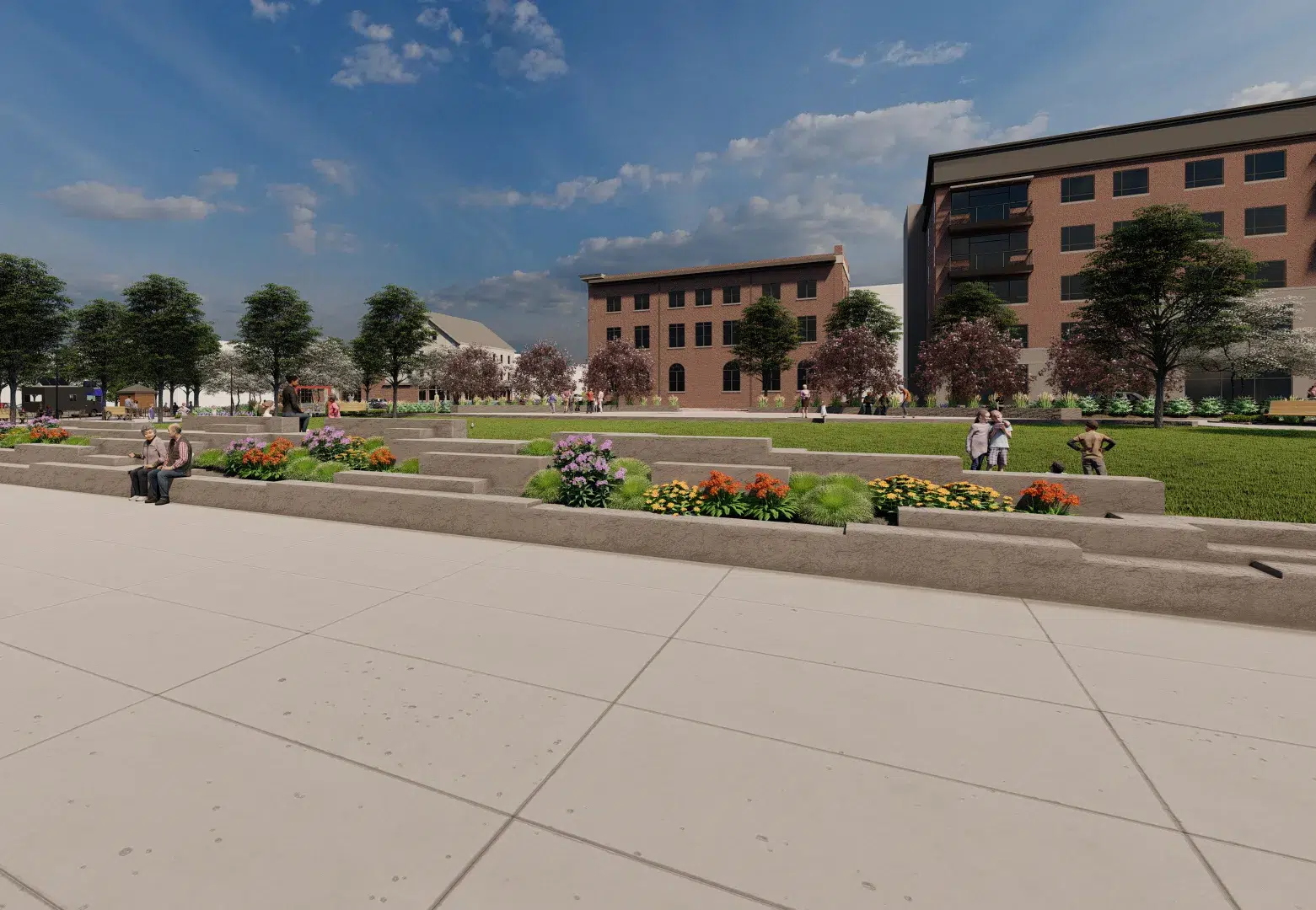 A landscaped courtyard designed by a Maine engineering firm features flower beds, trees, and people relaxing, with brick buildings and a partly cloudy sky in the background.